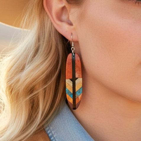 Multi Inlay earrings handcrafted by Native American artist Rudy Coriz