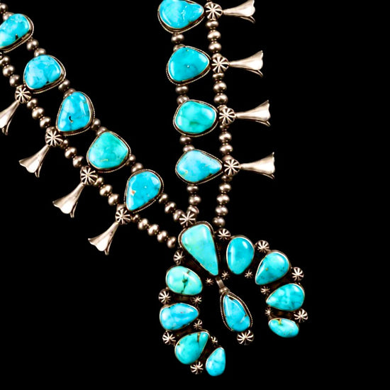 Natural Fox Turquoise squash blossom handcrafted by Native American artist Darrin Livingston