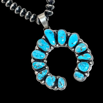 Natural Morenci Turquoise pendant handcrafted by Native American artist Bobby Johnson