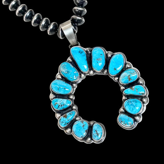 Natural Morenci Turquoise pendant handcrafted by Native American artist Bobby Johnson