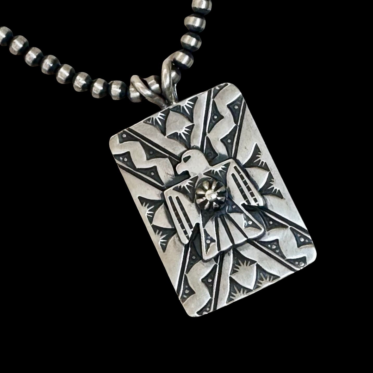 The Elirae Pendant Sterling Silver pendant handcrafted by Native American artist Bo Reeves