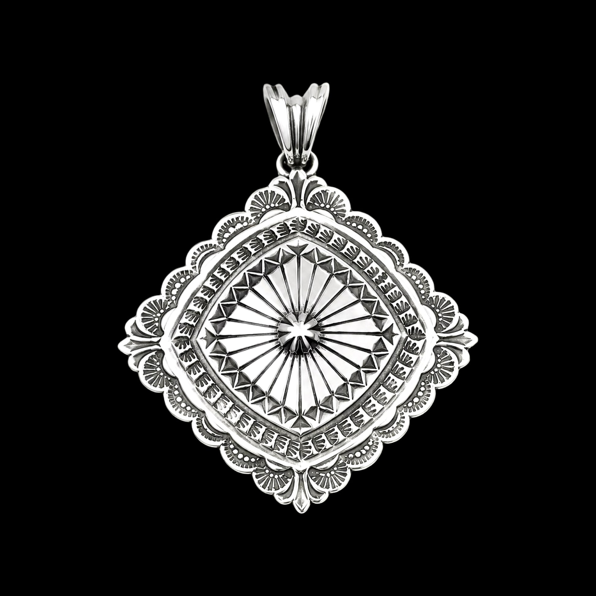 Sterling Silver pendant handcrafted by Native American artist Sunshine Reeves