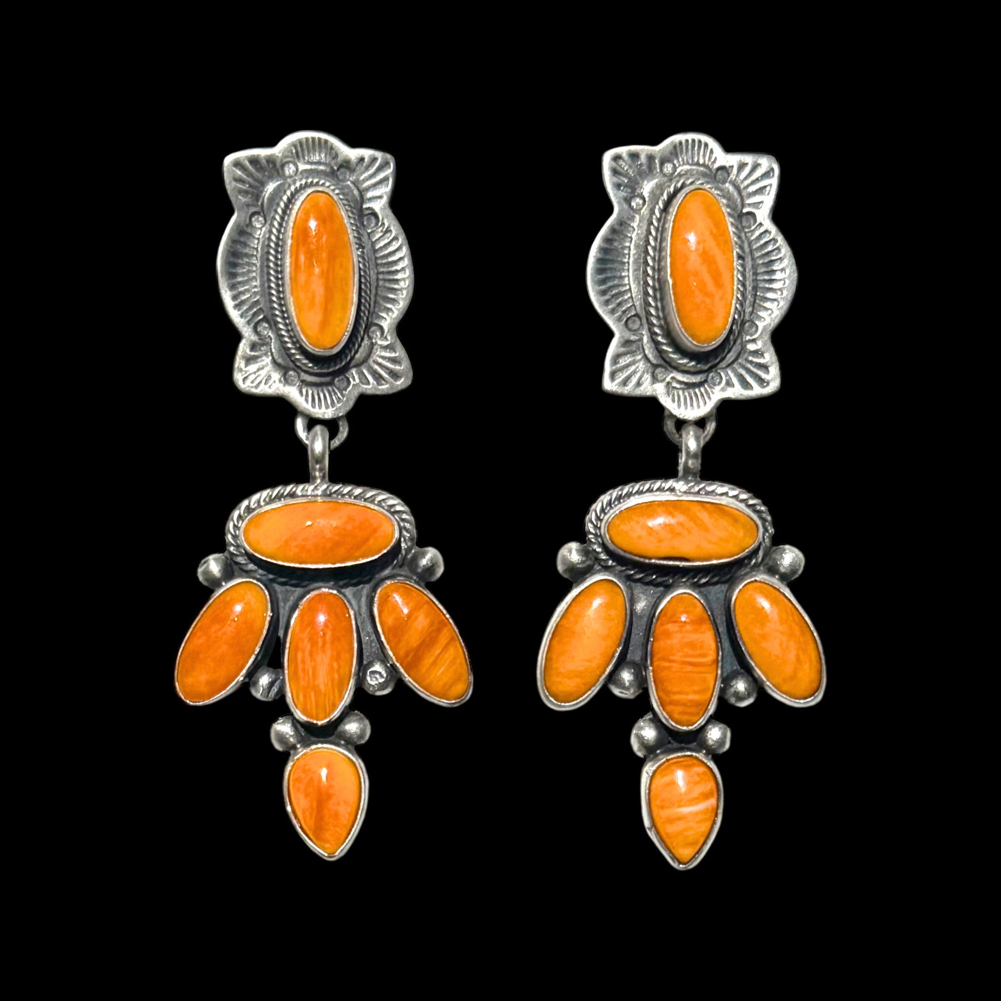 Orange Spiny Oyster earrings handcrafted by Native American artist Ray Bennett