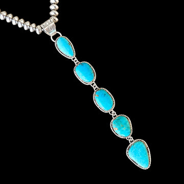 Kingman Turquoise pendant handcrafted by Native American artist Lorenzo and Jerilyn Chee