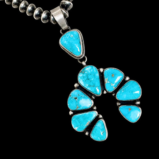 Natural Fox Turquoise pendant handcrafted by Native American artist Bobby Johnson