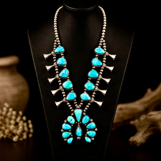 Natural Fox Turquoise squash blossom handcrafted by Native American artist Darrin Livingston