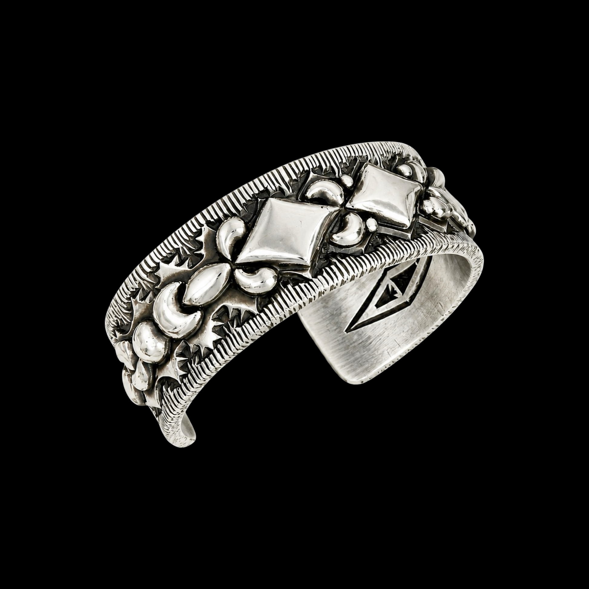 Sterling Silver cuff handcrafted by Native American artist Roland Dixon