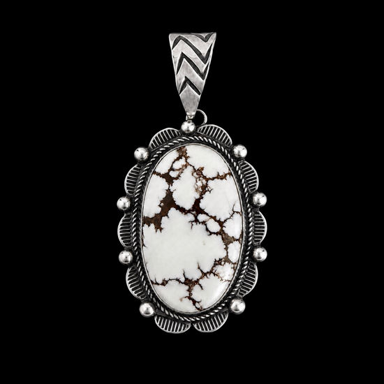 Necklace with a wild horse stone pendant on a black background by Donovan Nez