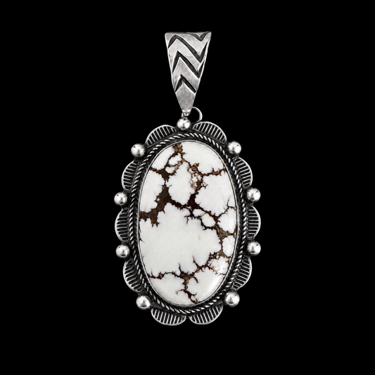 Necklace with a wild horse stone pendant on a black background by Donovan Nez
