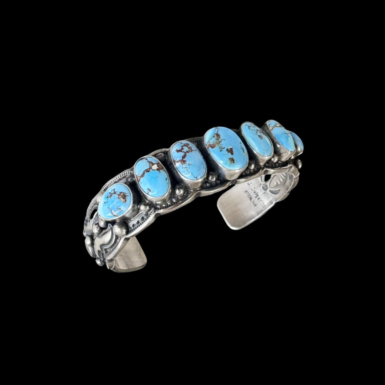 7 Stone Natural Golden Hills Turquoise cuff handcrafted by Native American artist Jereme Delgarito