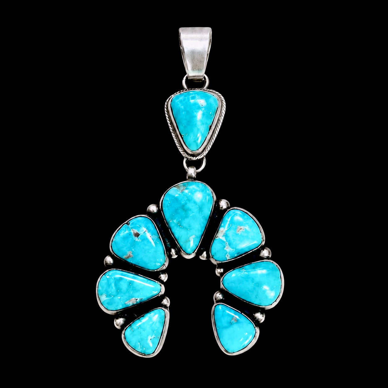 Natural Fox Turquoise pendant handcrafted by Native American artist Bobby Johnson
