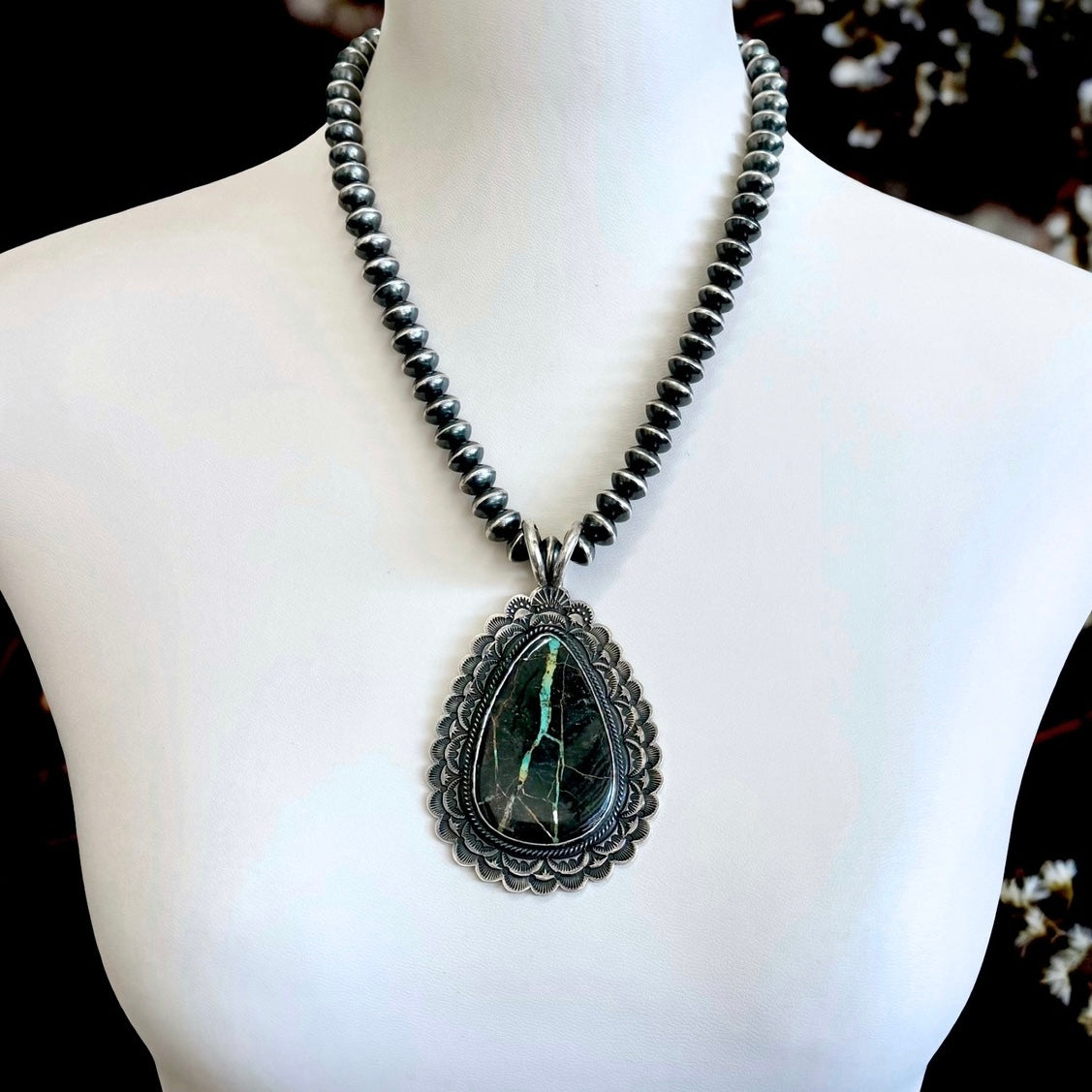 Blackjack Turquoise pendant handcrafted by Native American artist Sunshine Reeves