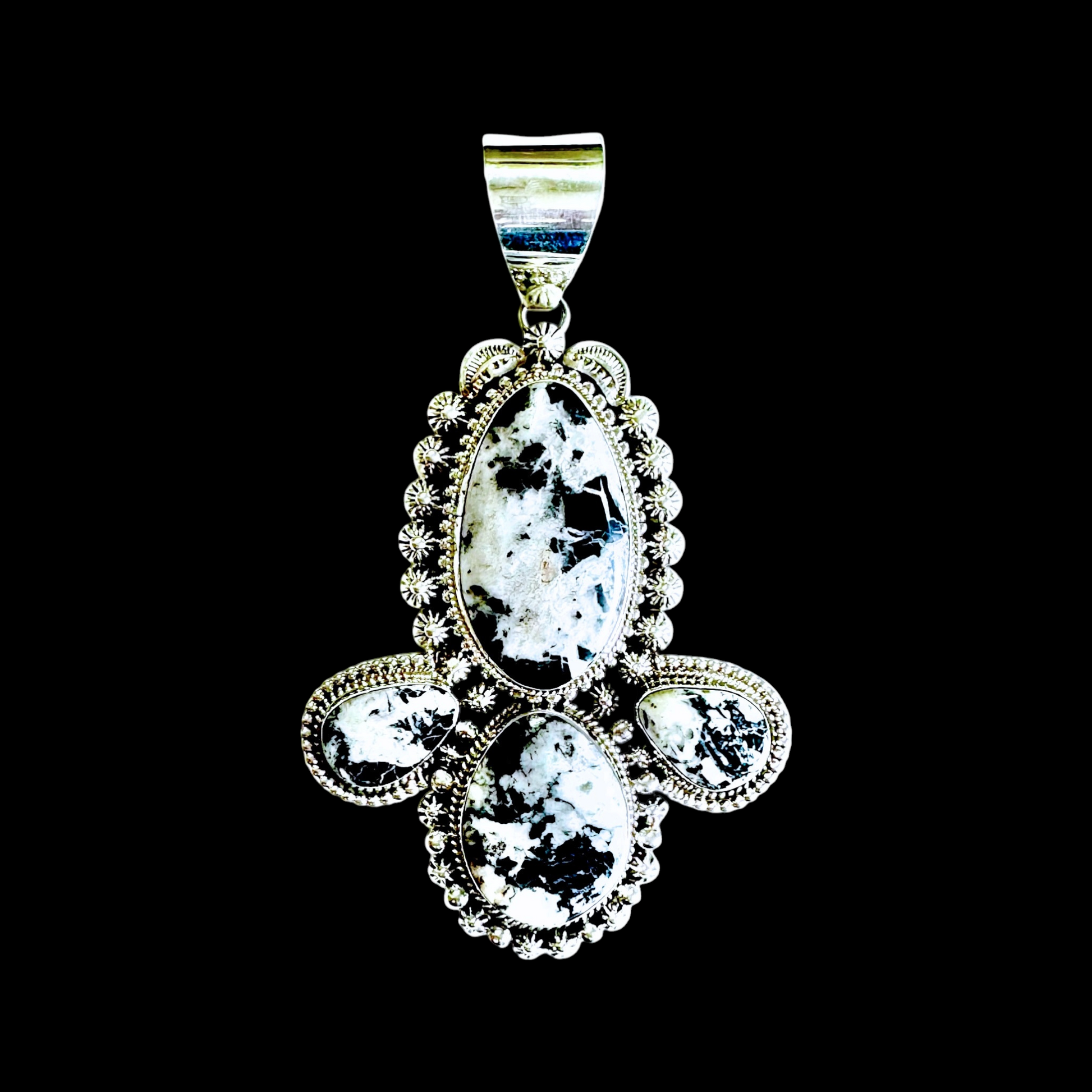 White Buffalo Dolomite pendant handcrafted by Native American artist Lucinda Linkin