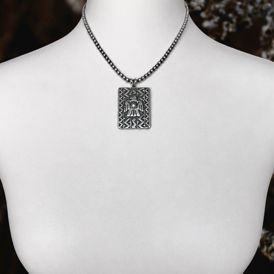 The Elirae Pendant Sterling Silver pendant handcrafted by Native American artist Bo Reeves