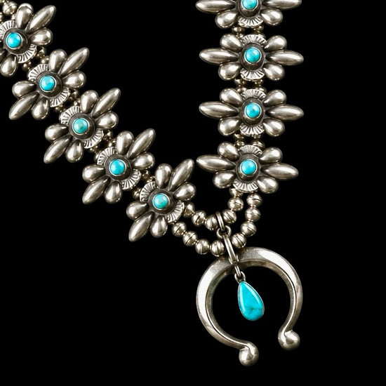 Kingman Turquoise and Sterling Silver squash blossom handcrafted by Native American artist Robert Johnson