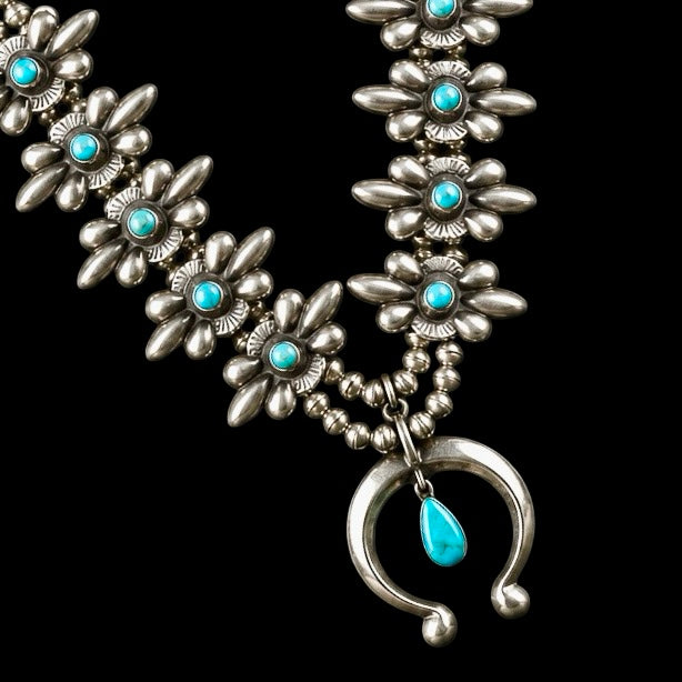 Kingman Turquoise and Sterling Silver squash blossom handcrafted by Native American artist Robert Johnson
