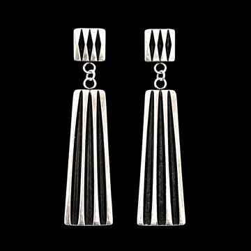 Sterling Silver earrings handcrafted by Native American artist Leander Tahe