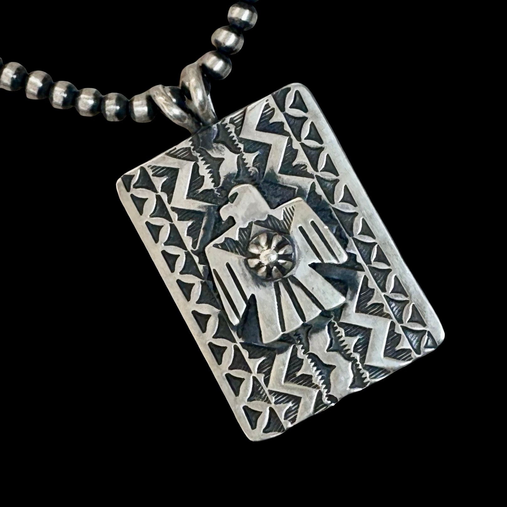 The Elirae Pendant Sterling Silver pendant handcrafted by Native American artist Bo Reeves