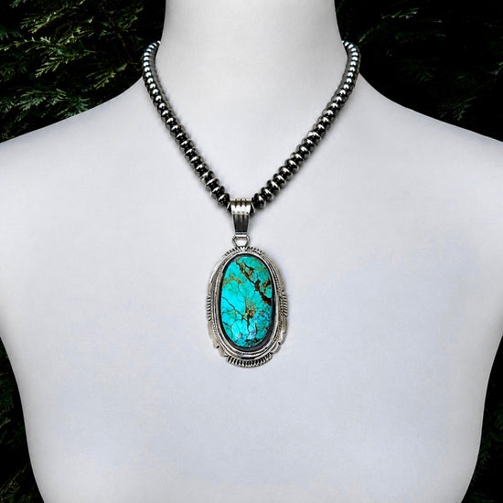 Royston Turquoise pendant handcrafted by Native American artist Jimson Belin