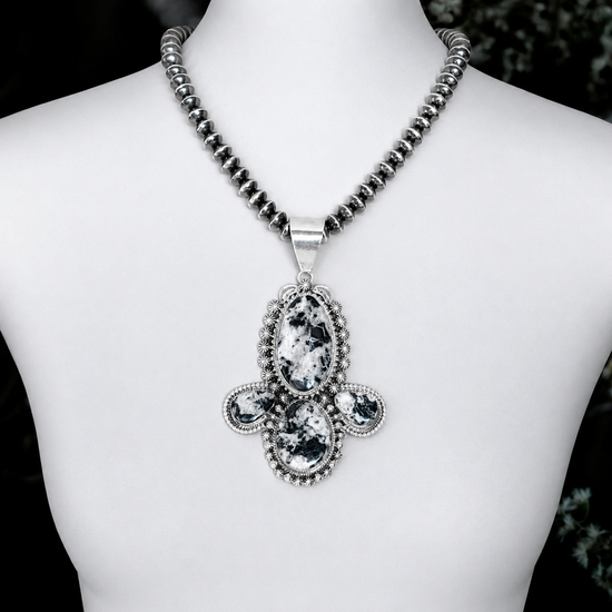 White Buffalo Dolomite pendant handcrafted by Native American artist Lucinda Linkin