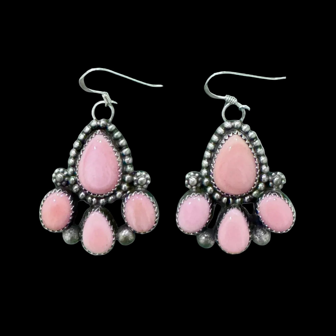 Pink Conch earrings handcrafted by Native American artist Chris Etsitty