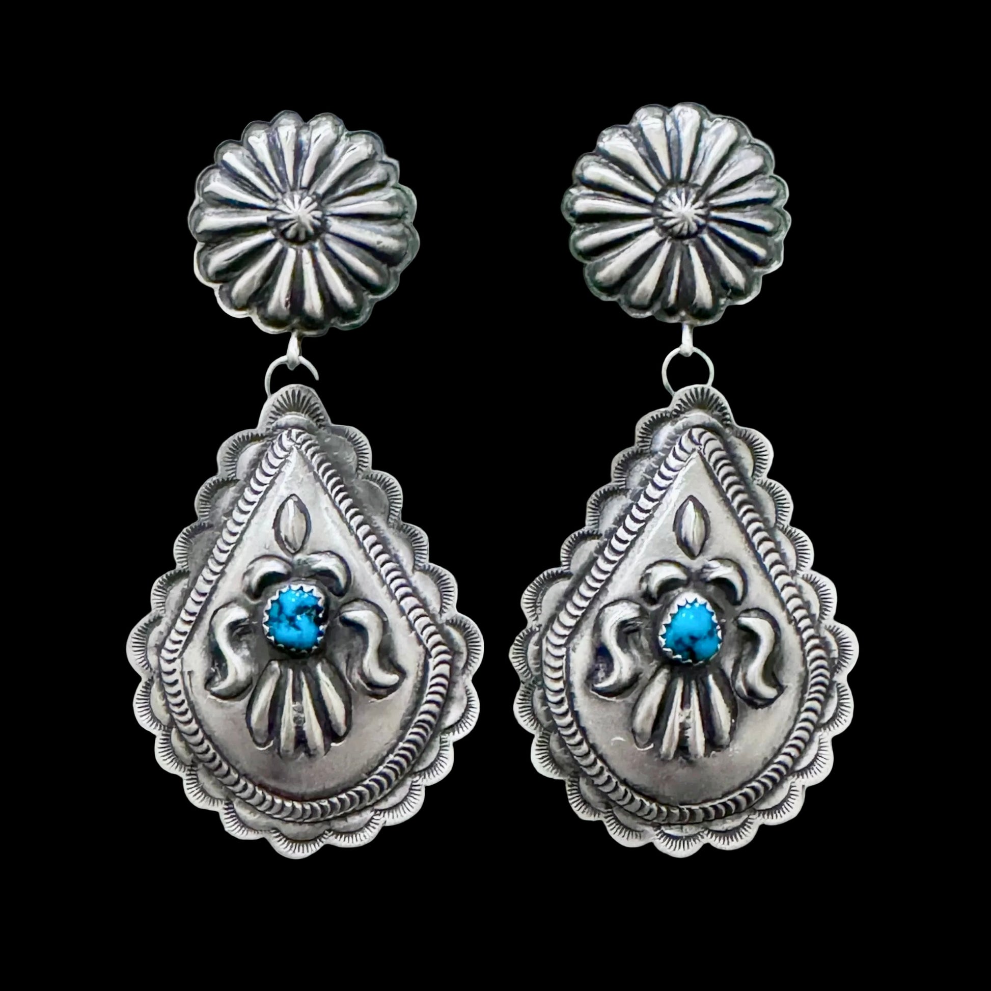 Kingman Turquoise earrings handcrafted by Native American artist Eugene Charlie