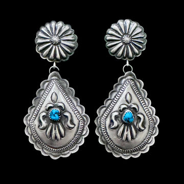 Kingman Turquoise earrings handcrafted by Native American artist Eugene Charlie