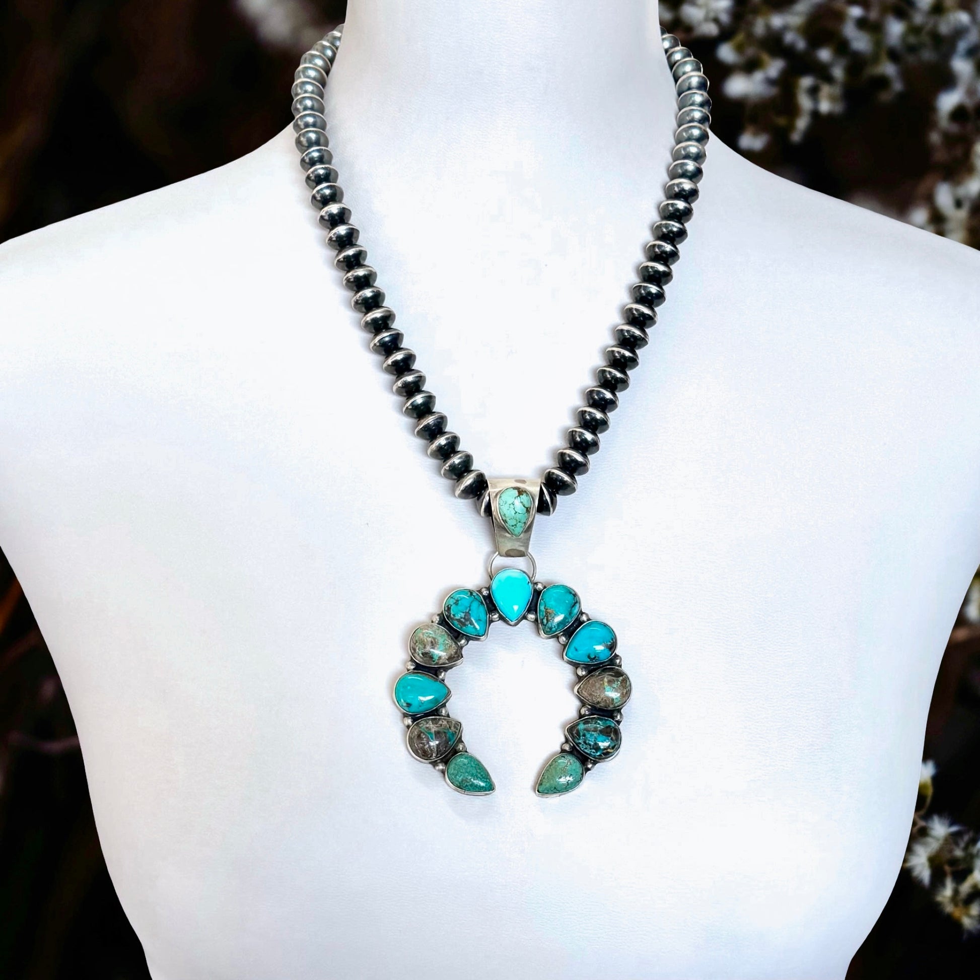 Carico Lake Turquoise pendant handcrafted by Native American artist Randall Endito