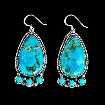 Kingman Turquoise earrings handcrafted by Native American artist Raymond Yazzie