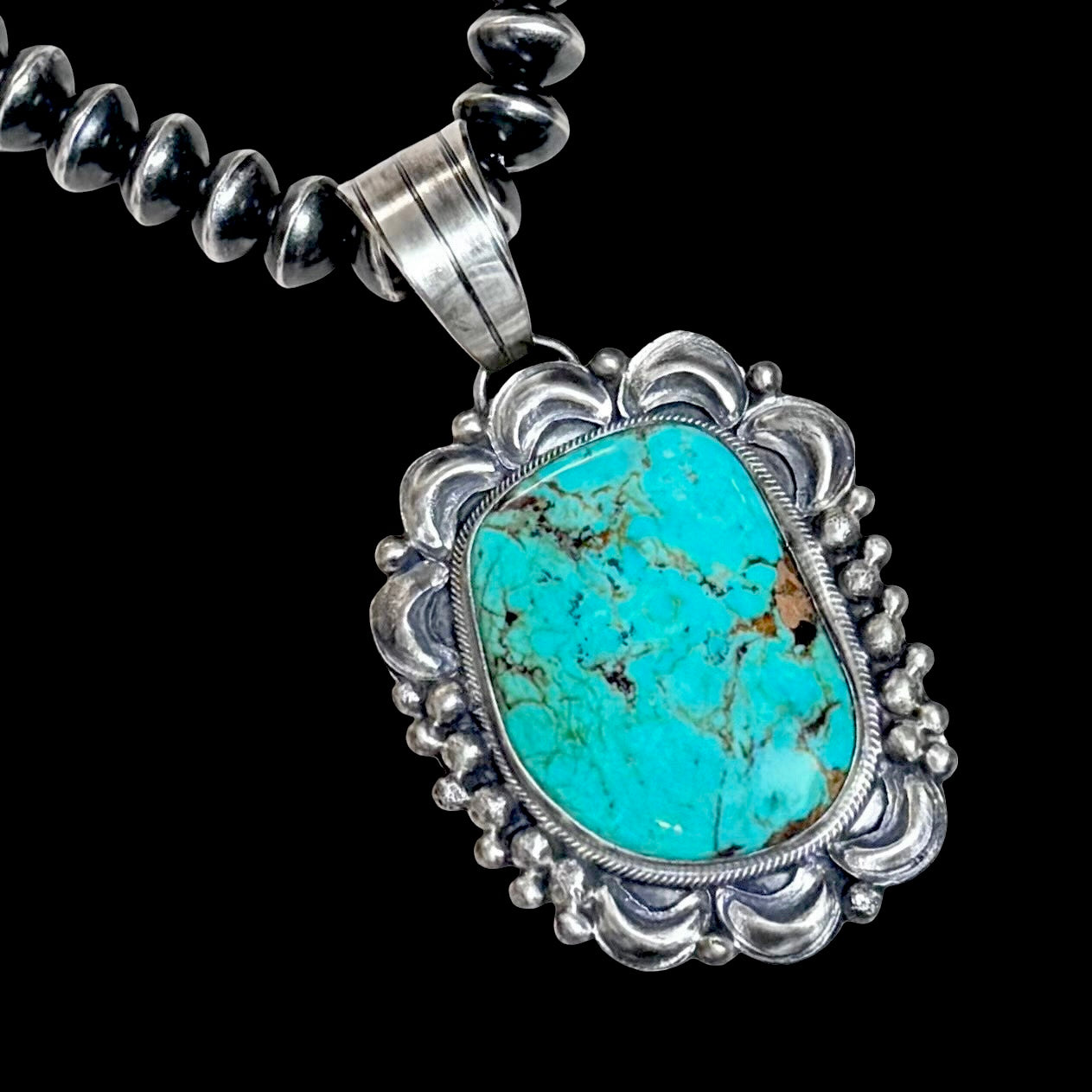 Kingman Turquoise pendant handcrafted by Native American artist Tillie Jon