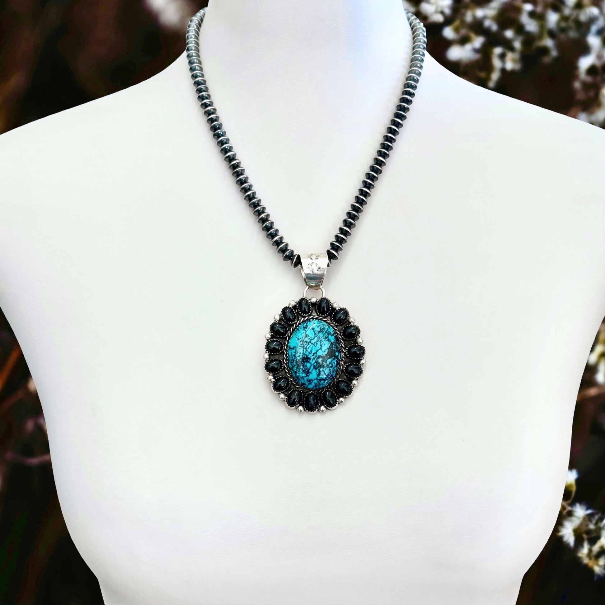 Kingman Turquoise & Black Onyx pendant handcrafted by Native American artist Lorenzo and Jerilyn Chee ￼