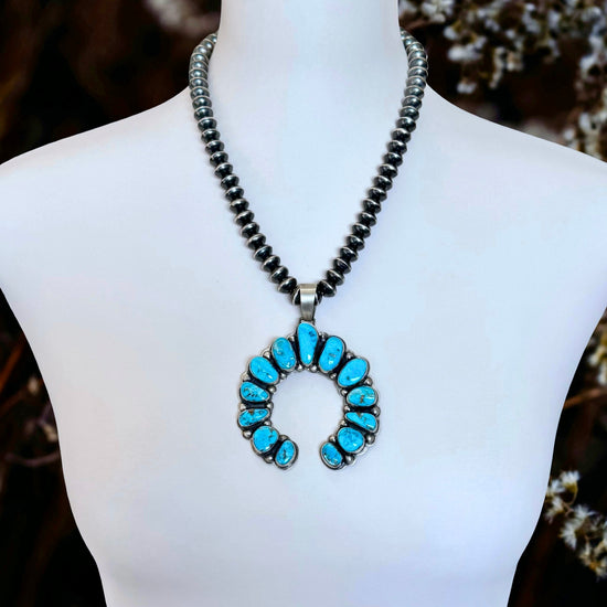 Natural Morenci Turquoise pendant handcrafted by Native American artist Bobby Johnson