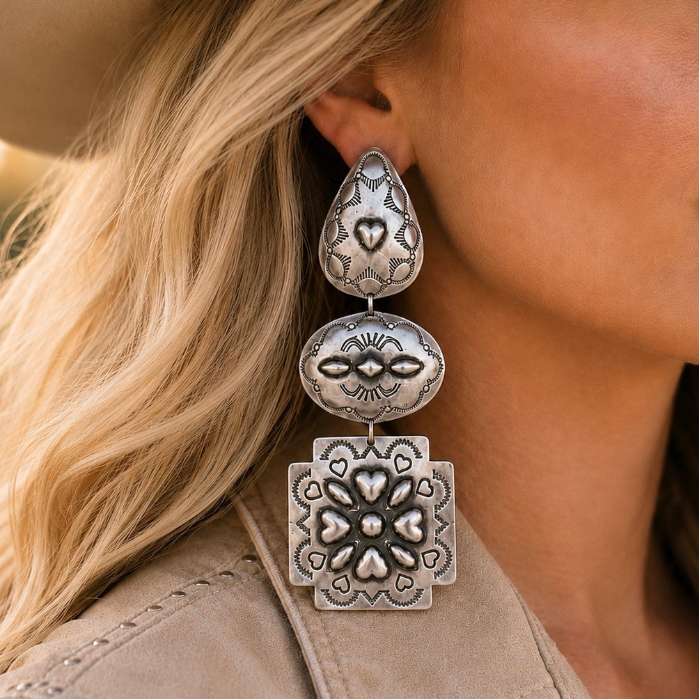 Sterling Silver earrings handcrafted by Native American artist Rita Lee