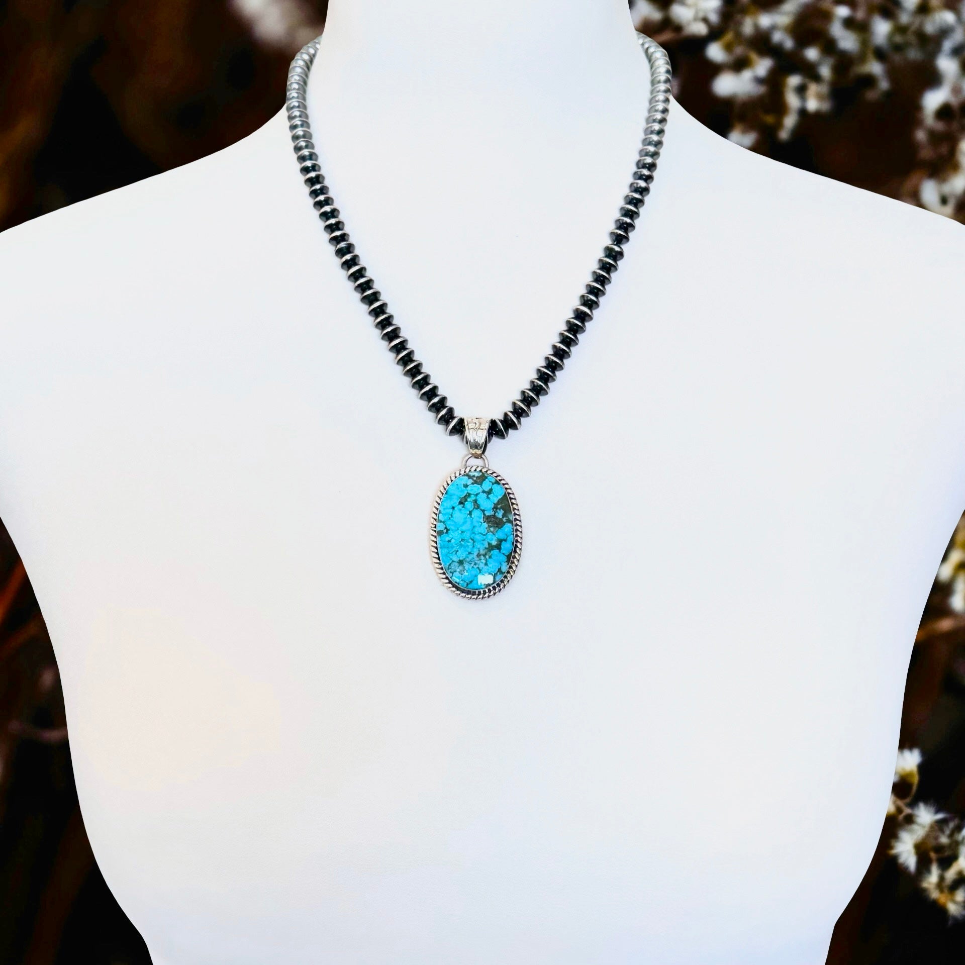 Kingman Turquoise pendant handcrafted by Native American artist Sheena Jack