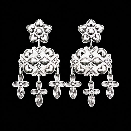 Sterling Silver Repoussé earrings handcrafted by Native American artist Tim Yazzie
