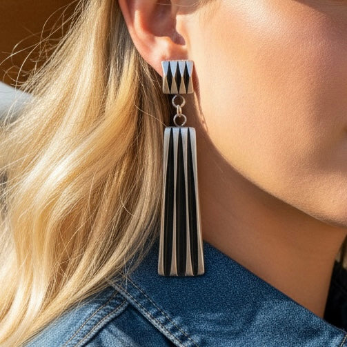 Sterling Silver earrings handcrafted by Native American artist Leander Tahe