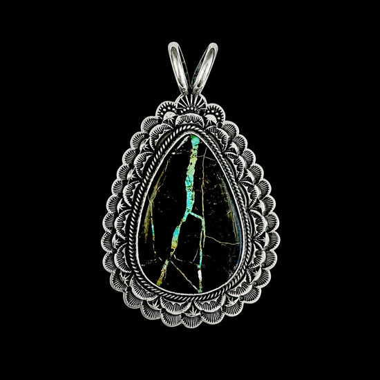 Blackjack Turquoise pendant handcrafted by Native American artist Sunshine Reeves