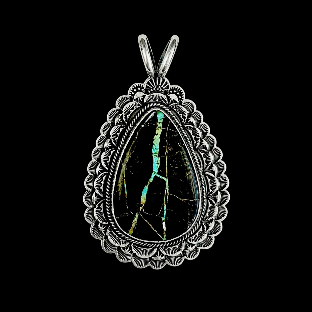 Blackjack Turquoise pendant handcrafted by Native American artist Sunshine Reeves