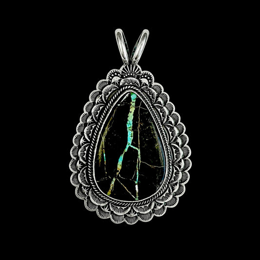 Blackjack Turquoise pendant handcrafted by Native American artist Sunshine Reeves