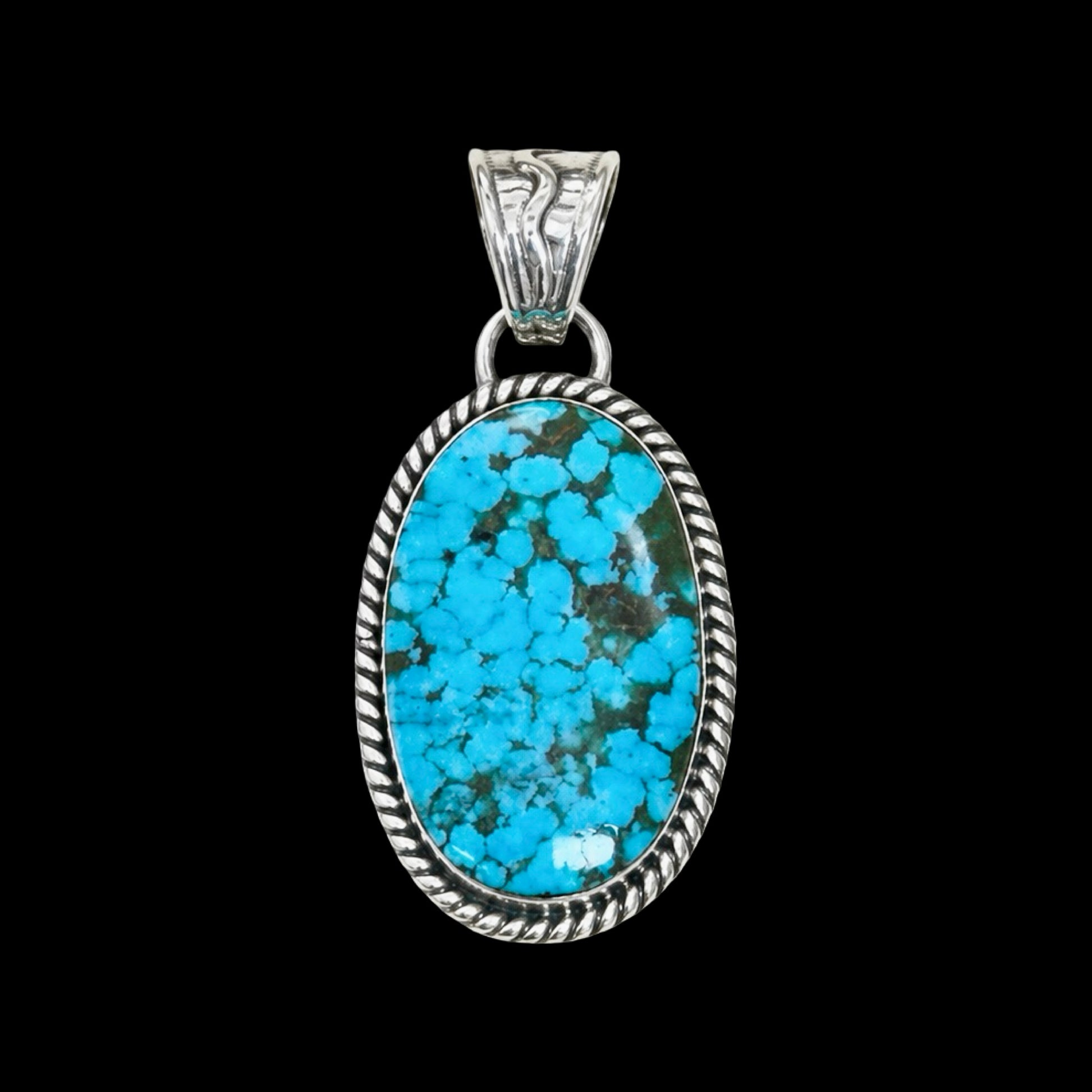 Kingman Turquoise pendant handcrafted by Native American artist Sheena Jack