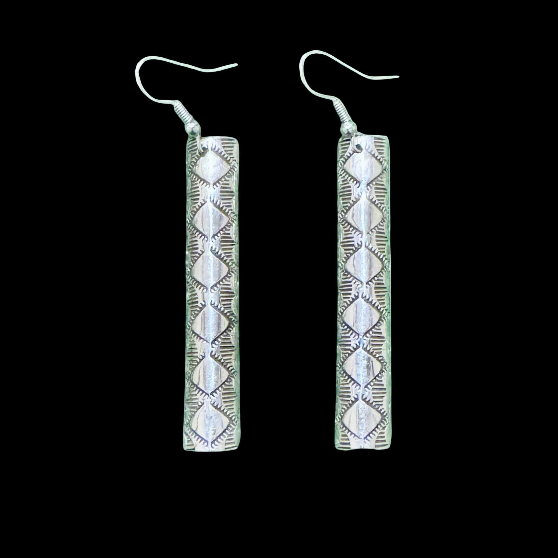 Sterling Silver earrings handcrafted by Native American artist Nova Ashley