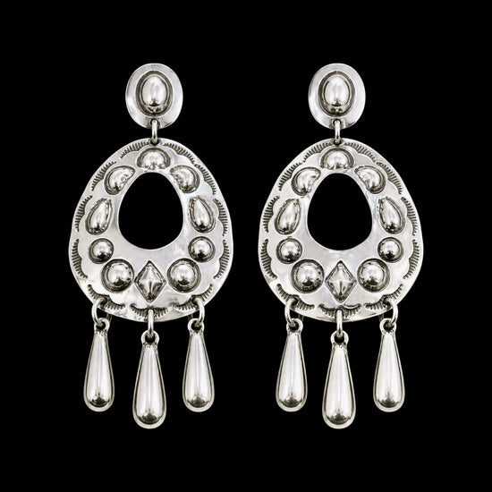 Sterling Silver Repoussé earrings handcrafted by Native American artist Tim Yazzie