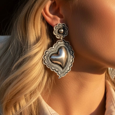 Sterling Silver Repoussé earrings handcrafted by Native American artist Leander Tahe