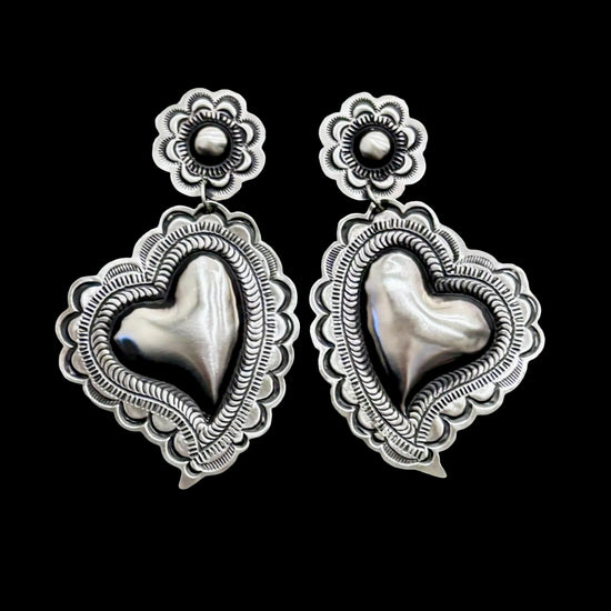 Sterling Silver Repoussé earrings handcrafted by Native American artist Leander Tahe