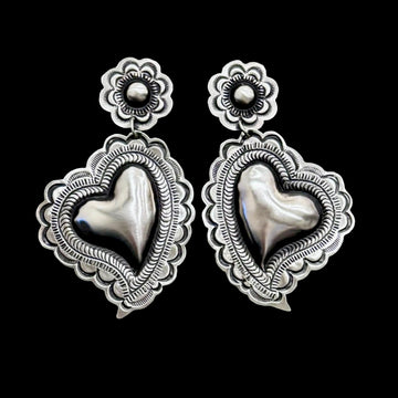 Sterling Silver Repoussé earrings handcrafted by Native American artist Leander Tahe