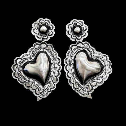 Sterling Silver Repoussé earrings handcrafted by Native American artist Leander Tahe