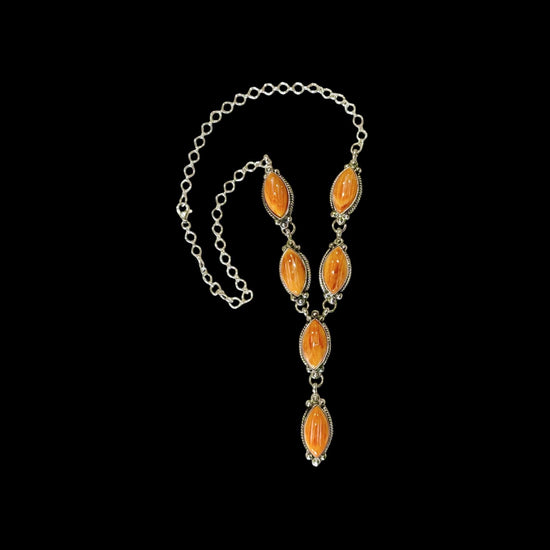 Orange Spiny Oyster lariat handcrafted by Native American artist Robert Martinez