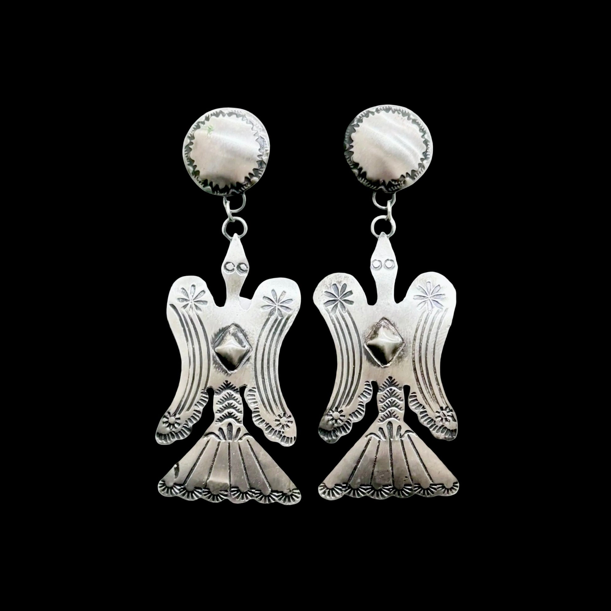 Sterling Silver earrings handcrafted by Native American artist Tim Yazzie