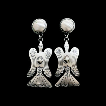 Sterling Silver earrings handcrafted by Native American artist Tim Yazzie