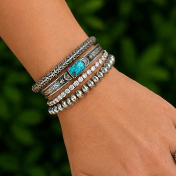 Webbed Kingman Turquoise cuff handcrafted by Native American artist Melvin Francis
